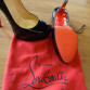 Christian Louboutins mit roter Sohle
